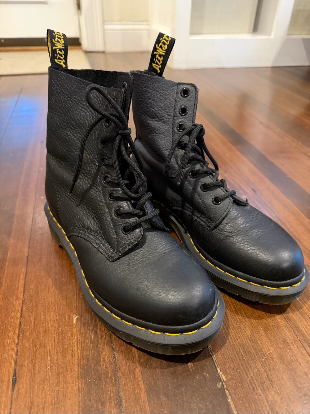 Dr. Martens Black Leather 8-Eye Lace-Up Boots with Yellow Stitching